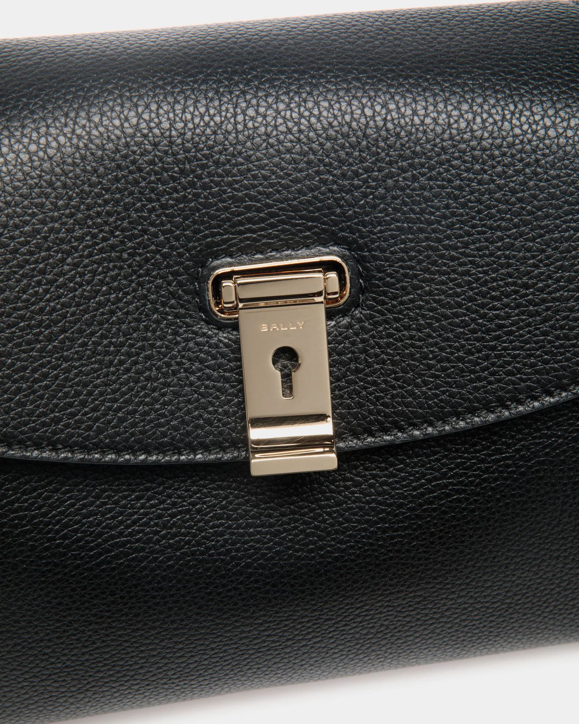 Lock Me Small Top Handle Bag In Black Grained Leather 