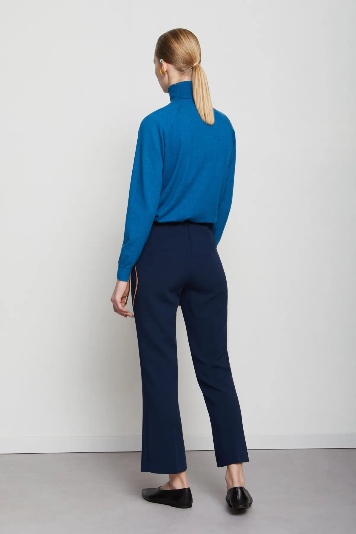 Trousers with pleats